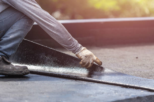 Professional Waterproofing technician working in Syracuse, KS